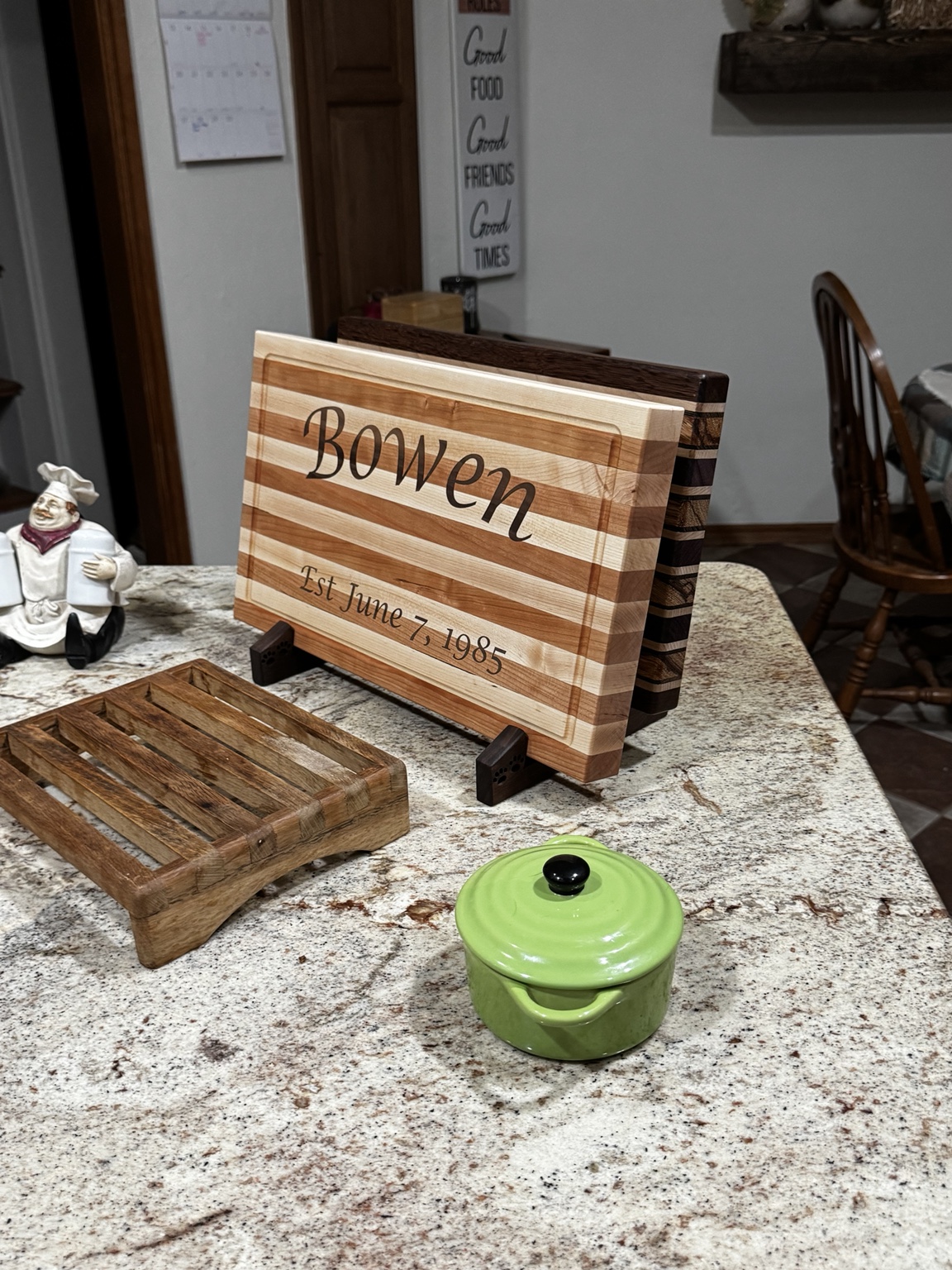 Actual WoodenYou personalized family-name cutting board