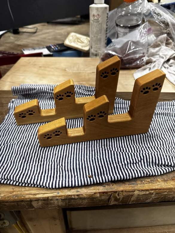 Pair of hardwood cherry display supports, real product photo